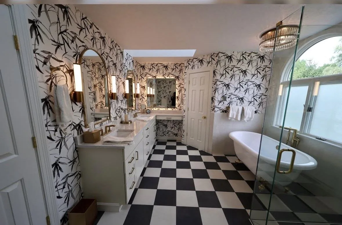 Black and White master bathroom with freestanding tub and glass shower